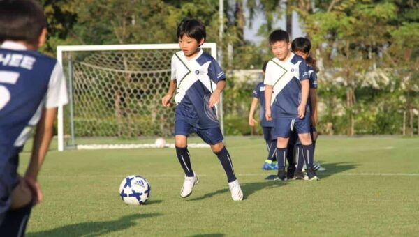03b_BASIS Students Football BASIS International School Bangkok students playing football on the outdoor field