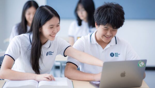A BASIS International School Bangkok student working on a laptop in class