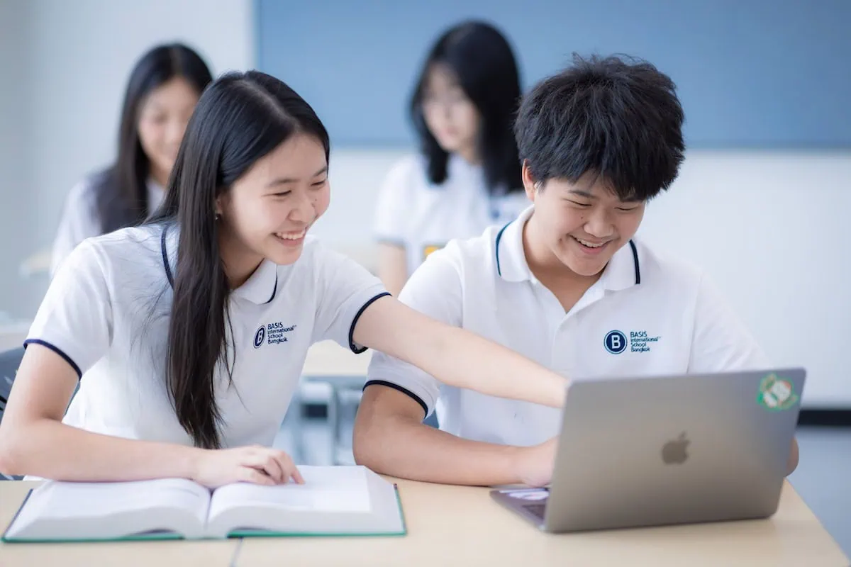 Students having fun while studying for advance placement classes
