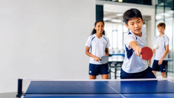 Table tennis at BASIS International School Bangkok BASIS International School Bangkok students playing table tennis indoors