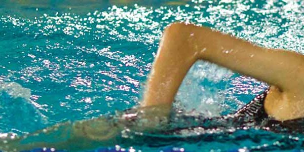 high-school-student-swimming A BASIS International School Bangkok student swimming front crawl in the 25 meter competition pool