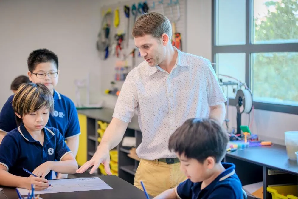 A teacher teaching at an international school program in Bangkok.